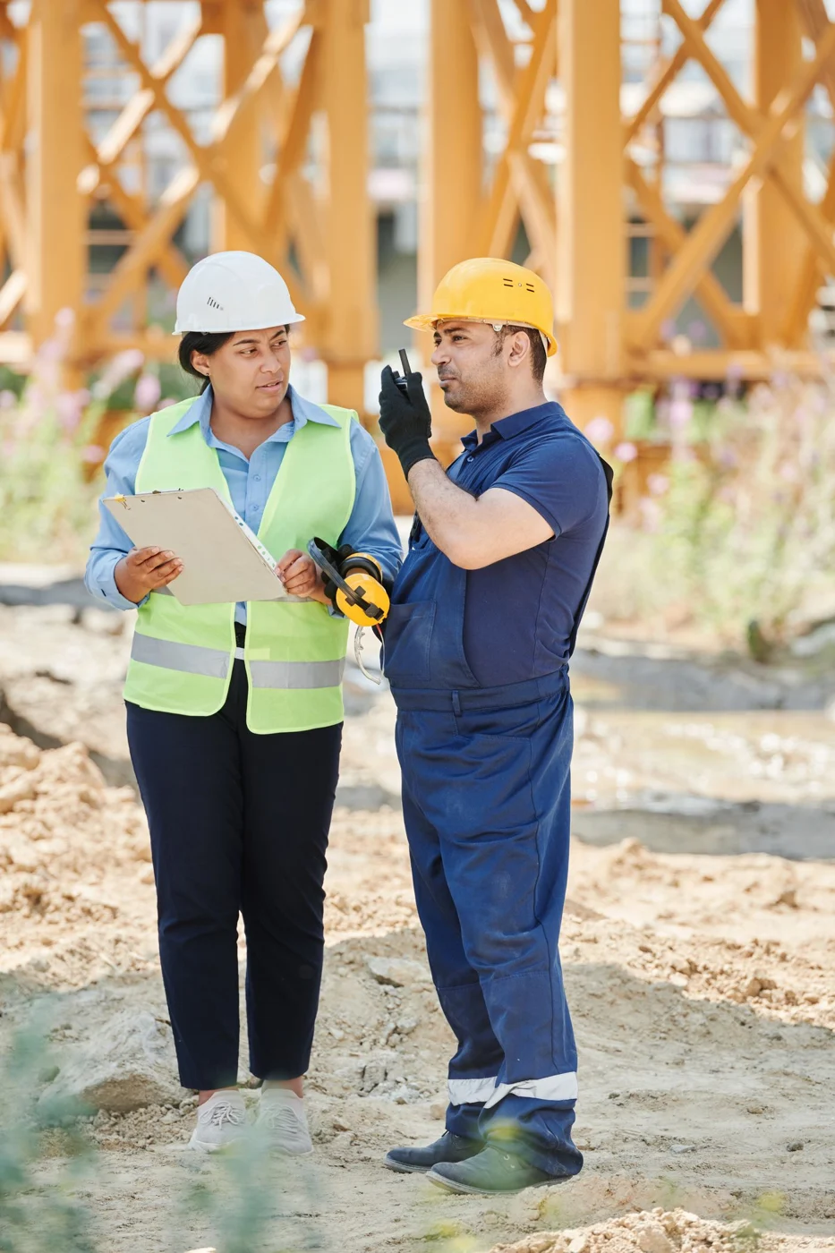 Representative site engineers reviewing project plans